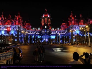Mumbai's main railway station, the Chhatrapati Shivaji Terminus, is lit up in the colors of the French national flag on November 15, 2015.
AFP / Getty
 