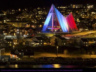 The Arctic Cathedral is illuminated in the French national colors in Tromso, Norway, on November 14, 2015. Norsk Telegrambyra AS / Reute / REUTERS
 