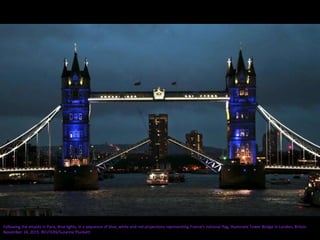 Following the attacks in Paris, blue lights, in a sequence of blue, white and red projections representing France's national flag, illuminate Tower Bridge in London, Britain
November 14, 2015. REUTERS/Suzanne Plunkett
 