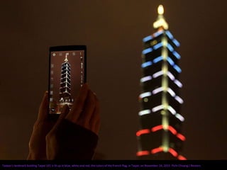 Taiwan's landmark building Taipei 101 is lit up in blue, white and red, the colors of the French flag, in Taipei, on November 14, 2015. Pichi Chuang / Reuters
 