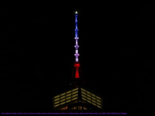 One World Trade Center is lit in honor of the victims of the attacks in Paris, in Manhattan, New York November 13, 2015. REUTERS/Carlo Allegri
 