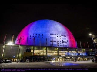 The Ericsson Globe Arena in Stockholm is illuminated in the French colors blue, white and red in honor of the victims of the attacks in Paris November 14, 2015.
REUTERS/Christine Olsson/TT News Agency
 