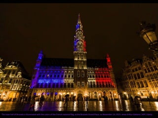 The town hall of Brussels is illuminated with the colors of the French national flag, at the Brussels Grand Place, on November 14, 2015. ames Arthur Gekiere / AFP / Getty
 