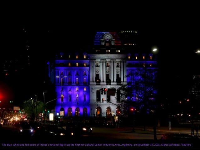 The town hall of Brussels is illuminated with the colors of the French national flag, at the Brussels Grand Place, on Nove...
