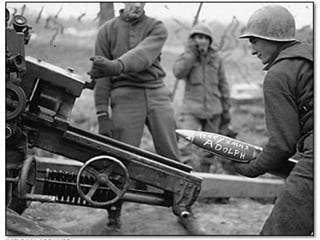 World War II 1945 Holding Bastogne In December of 1944, the Germans tried to break through the Allied defenses to invade France.  The defense perimeter at the point of attack, near Bastogne was weak and poorly supported.  Dense forests and bad weather gave the Nazis an advantage, and allowed their Panzer armor division to penetrate 60 miles into the Allied perimeter- causing a “bulge” in the line.  After refusing to surrender while surrounded, the US troops of the 101st Airborne division held off the Germans until back-up arrived.  The Germans were then pushed back to the original Siegfried line.  The Battle of the Bulge was the largest ground battle of the war and took over 120,000 German lives.  