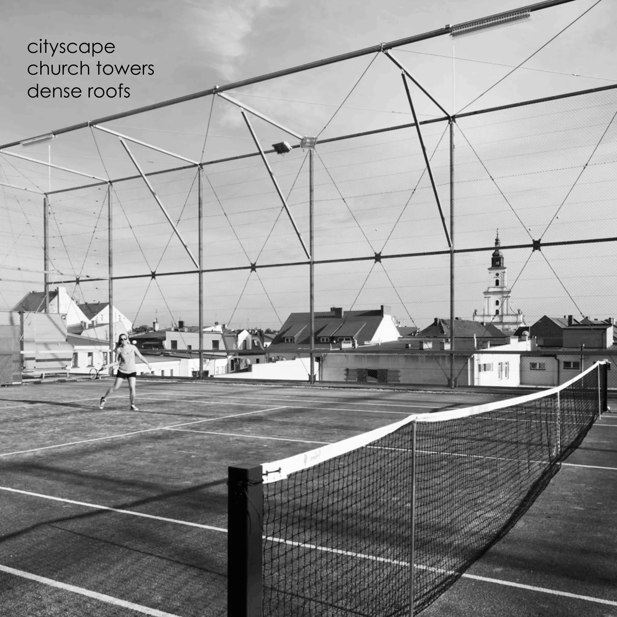 cityscape
church towers
dense roofs
 