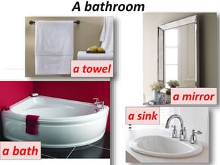 A bathroom
a bath
a sink
a mirror
a towel