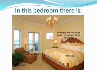 In this bedroom there is:
One bed
And there are two lamps
on the corner and some
cushions
An armchair
A plant
 