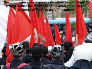 The group refuses to disperse citing their peaceful right to
protest. Notice the thickness of the wood for the flags?
Evidence of their “peaceful” intentions
 