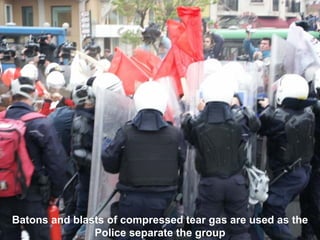 Batons and blasts of compressed tear gas are used as the
Police separate the group
 