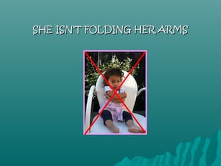 SHE ISN’T FOLDING HER ARMS
 