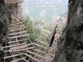Workers build a footpath around the vertiginous
     slopes of Shifou Mountain in China
 