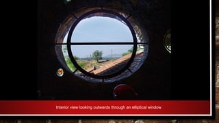 Interior view looking outwards through an elliptical window
 