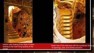 Interior view looking at the flight of stairs
leading to the main living spaces of the
house
Detail view of the staircase with the curvilinear forms
of openings, pots, and arches around it
 
