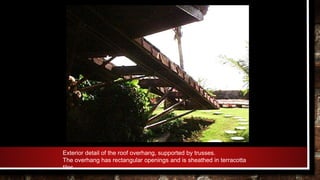 Exterior detail of the roof overhang, supported by trusses.
The overhang has rectangular openings and is sheathed in terracotta
tiles
 