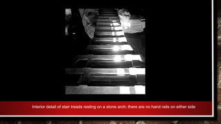 Interior detail of stair treads resting on a stone arch; there are no hand rails on either side
 