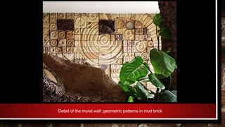 Detail of the mural wall: geometric patterns in mud brick
 