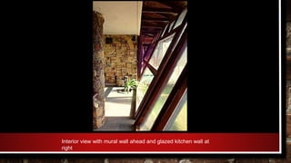 Interior view with mural wall ahead and glazed kitchen wall at
right
 