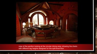 view of the pavilion looking at the circular dining area, showing the chairs
with different leg heights designed for the split-level floor
 