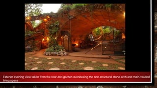 Exterior evening view taken from the rear-end garden overlooking the non-structural stone arch and main vaulted
living space
 