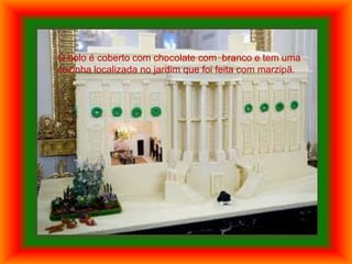O bolo é coberto com chocolate com branco e tem uma
cozinha localizada no jardim que foi feita com marzipã.
 