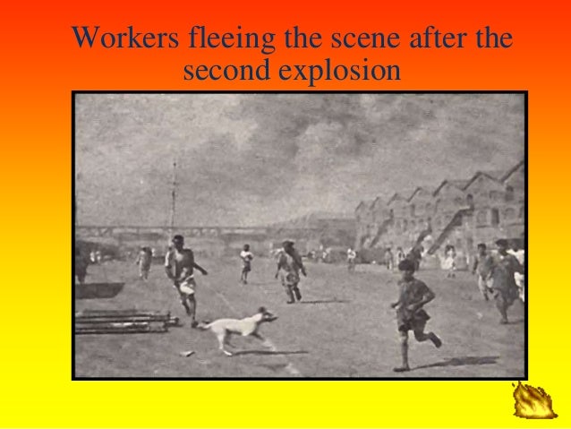 Workers fleeing the scene after the
second explosion
 
