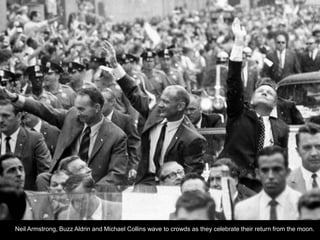 Neil Armstrong, Buzz Aldrin and Michael Collins wave to crowds as they celebrate their return from the moon.
 
