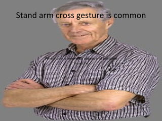 Stand arm cross gesture is common When  one is among strangers and presume insecure 