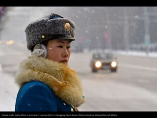 Female traffic police officer in the snow in February 2013, in Pyongyang, North Korea. (Photo by Andrew Macleod/Barcroft Media)
 