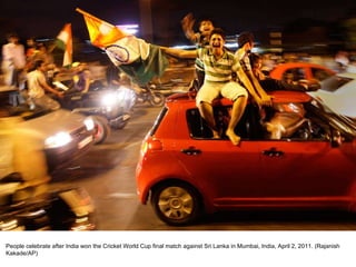People celebrate after India won the Cricket World Cup final match against Sri Lanka in Mumbai, India, April 2, 2011. (Rajanish Kakade/AP)  