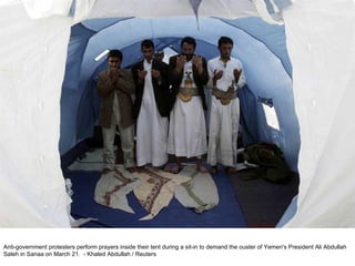 Anti-government protesters perform prayers inside their tent during a sit-in to demand the ouster of Yemen's President Ali Abdullah Saleh in Sanaa on March 21.  - Khaled Abdullah / Reuters  