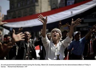 An anti-government protester chants during the Sunday, March 20, funeral procession for the demonstrators killed on Friday in Sanaa.  - Muhammed Muheisen / AP  