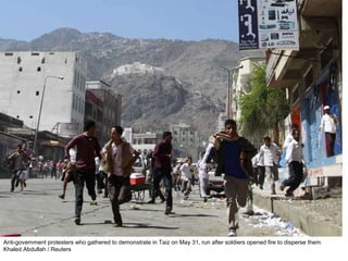 Anti-government protesters who gathered to demonstrate in Taiz on May 31, run after soldiers opened fire to disperse them. Khaled Abdullah / Reuters  