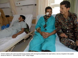 Yemeni soldiers who were wounded during clashes with anti-regime protesters the night before, rest at a hospital in the capital Sanaa on March 9. - Gamal Noman / AFP - Getty Images  