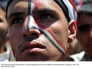 An anti-government protester with a Yemeni flag painted on his face attends a demonstration in Sanaa on Feb. 28. Yahya Arhab / EPA  