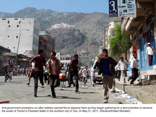 Anti-government protesters run after soldiers opened fire to disperse them as they began gathering for a demonstration to demand the ouster of Yemen's President Saleh in the southern city of Taiz, on May 31, 2011. (Reuters/Khaled Abdullah)  