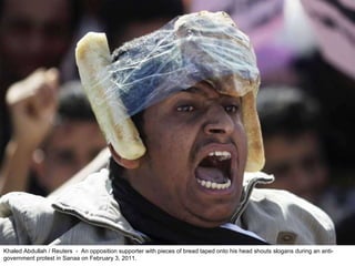 Khaled Abdullah / Reuters  -  An opposition supporter with pieces of bread taped onto his head shouts slogans during an anti-government protest in Sanaa on February 3, 2011.  