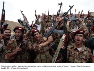 Defecting army soldiers shout slogans as they take part in a rally to demand the ouster of Yemen's President Saleh in Sanaa, on May 27, 2011. (Reuters/Ammar Awad)  
