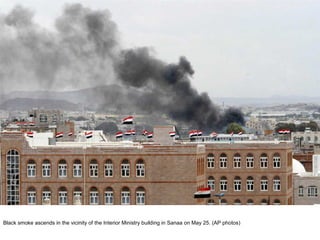 Black smoke ascends in the vicinity of the Interior Ministry building in Sanaa on May 25. (AP photos) 