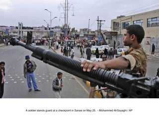 A soldier stands guard at a checkpoint in Sanaa on May 25.  - Mohammed Al-Sayaghi / AP  