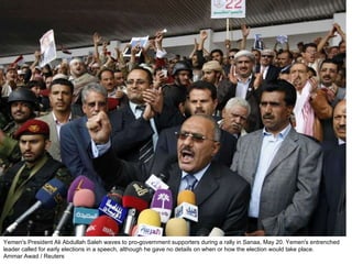 Yemen's President Ali Abdullah Saleh waves to pro-government supporters during a rally in Sanaa, May 20. Yemen's entrenched leader called for early elections in a speech, although he gave no details on when or how the election would take place.  Ammar Awad / Reuters  
