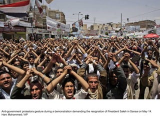 Anti-government protestors gesture during a demonstration demanding the resignation of President Saleh in Sanaa on May 14.  Hani Mohammed / AP  