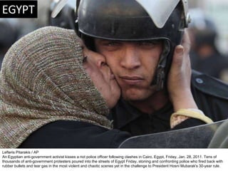 Lefteris Pitarakis / AP An Egyptian anti-government activist kisses a riot police officer following clashes in Cairo, Egyp...