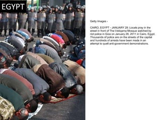 Getty Images -   CAIRO, EGYPT - JANUARY 28: Locals pray in the street in front of The l-Istiqama Mosque watched by riot po...