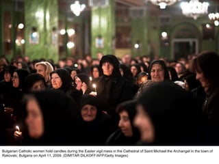 Bulgarian Catholic women hold candles during the Easter vigil mass in the Cathedral of Saint Michael the Archangel in the town of Rakovski, Bulgaria on April 11, 2009. (DIMITAR DILKOFF/AFP/Getty Images)  