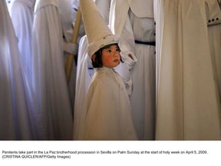 Penitents take part in the La Paz brotherhood procession in Sevilla on Palm Sunday at the start of holy week on April 5, 2009. (CRISTINA QUICLER/AFP/Getty Images)  