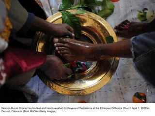 Deacon Buruk Kidane has his feet and hands washed by Reverend Gebrekiros at the Ethiopian Orthodox Church April 1, 2010 in Denver, Colorado. (Matt McClain/Getty Images)  