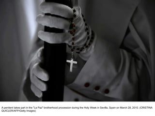 A penitent takes part in the "La Paz" brotherhood procession during the Holy Week in Sevilla, Spain on March 28, 2010. (CRISTINA QUICLER/AFP/Getty Images)  