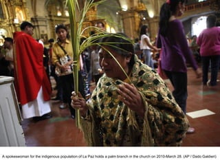 A spokeswoman for the indigenous population of La Paz holds a palm branch in the church on 2010-March 28. (AP / Dado Galdieri)  
