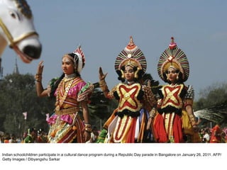 Indian schoolchildren participate in a cultural dance program during a Republic Day parade in Bangalore on January 26, 2011. AFP/
Getty Images / Dibyangshu Sarkar
 